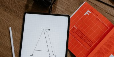 white and black pen on white paper